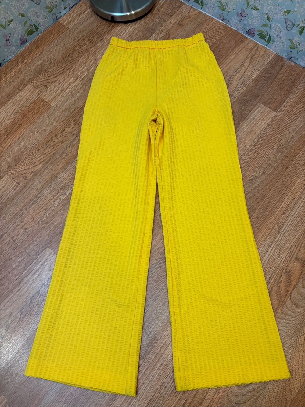 Vintage 1970’s Alex Colman vibrant yellow textured poly wide-leg pants. Size M.